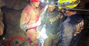 Four remain trapped in flooded Laos cave after one rescued