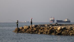 Iran Deal Announced, Strait of Hormuz Reopening Faces Delays