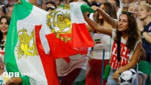 Iran diaspora divided over lion-and-sun flag at World Cup match