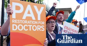 Resident doctors in England vote to accept government pay and jobs deal