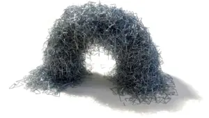 Staple-shaped particles create material that switches between strong and loose