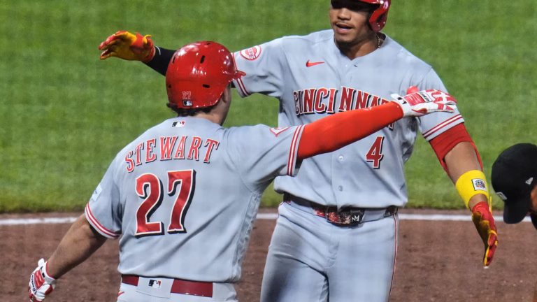 Suárez 3-run homer in 9th gives Reds 9-7 win over Pirates