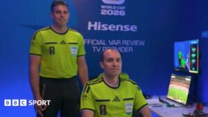 VAR official says hand gesture was involuntary after FIFA clears him