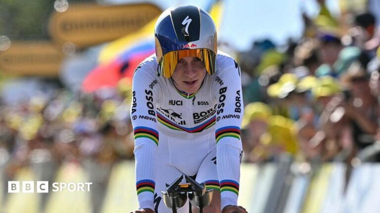 Evenepoel wins Tour de France stage 16 time trial, cuts Pogacar's lead