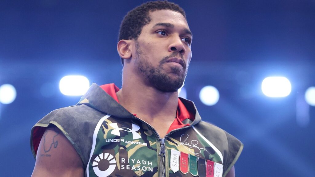 Joshua knocks out Prenga after being floored twice, Fury fight moves closer