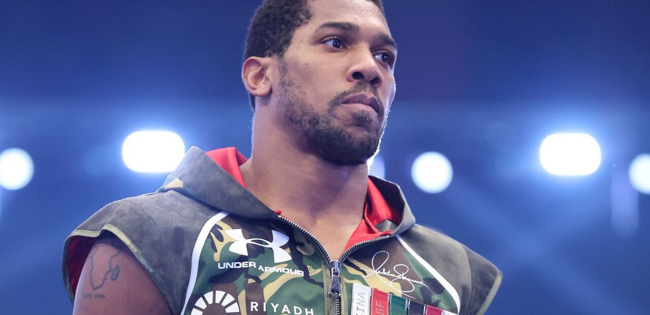 Joshua knocks out Prenga after being floored twice, Fury fight moves closer