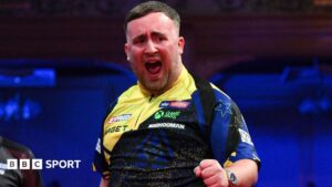 Littler throws nine-darter in World Matchplay win over Aspinall
