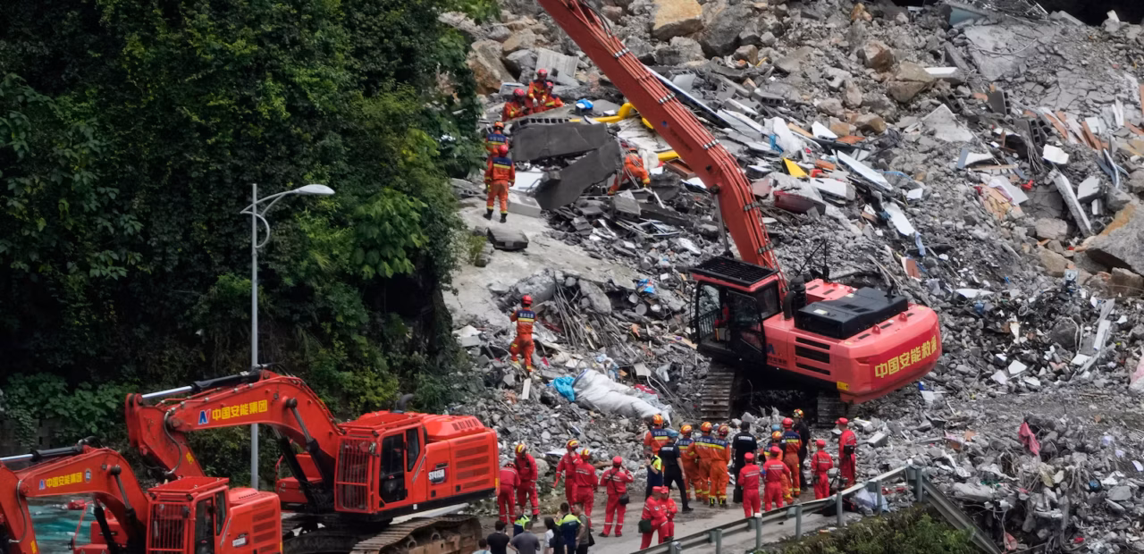 Rescuers search for survivors after China landslide kills at least 8