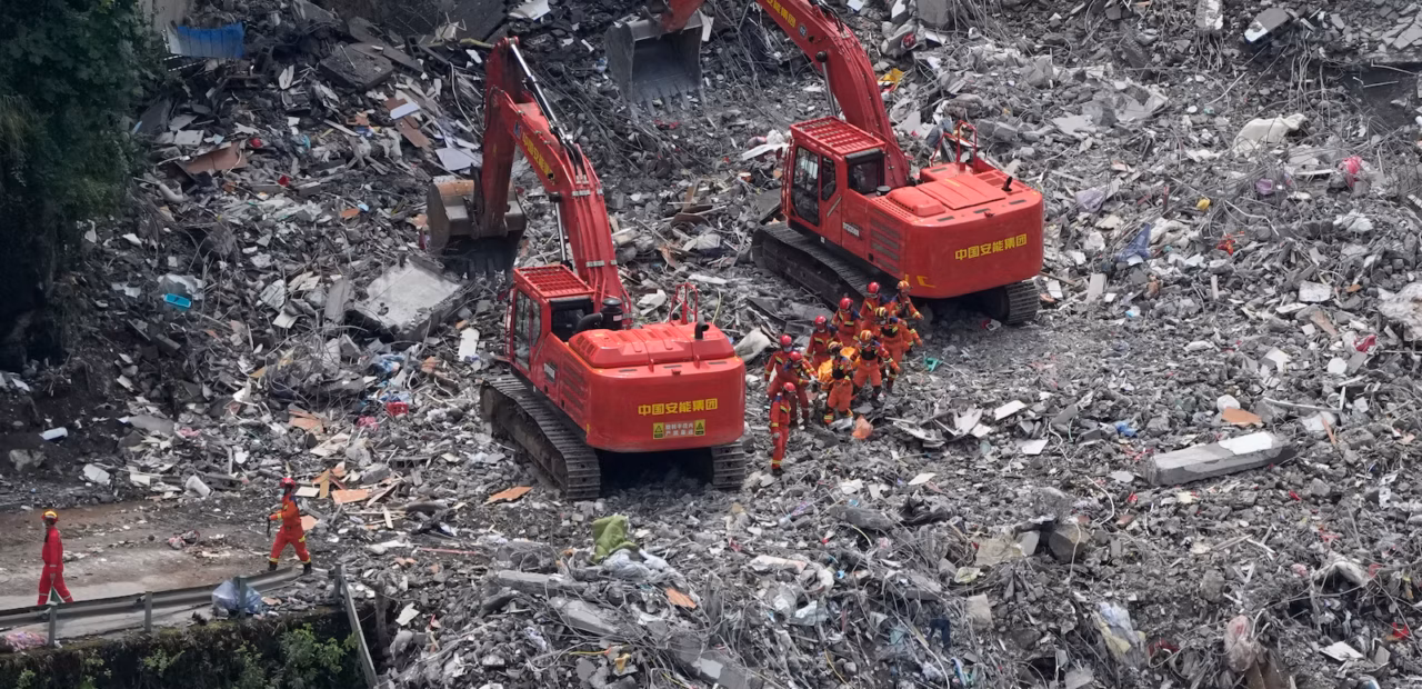 Rescuers search rubble after China landslide kills 8, leaves 34 missing